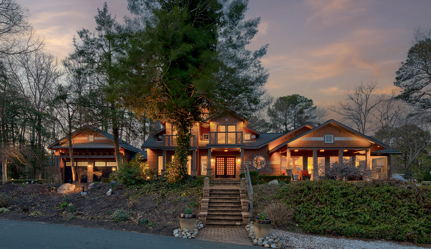 a house with a lot of windows and stairs