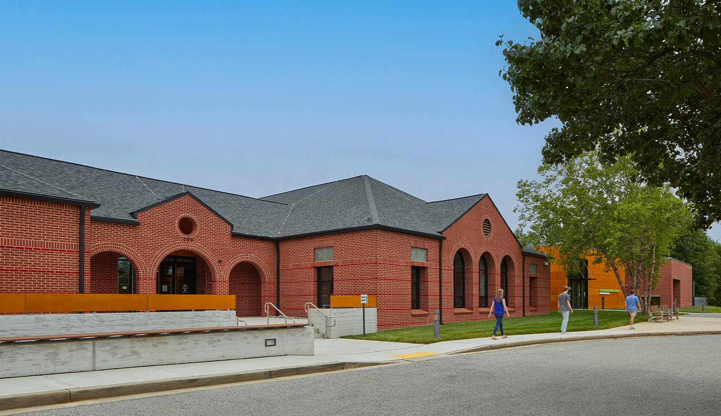 a red brick building on the corner of a street