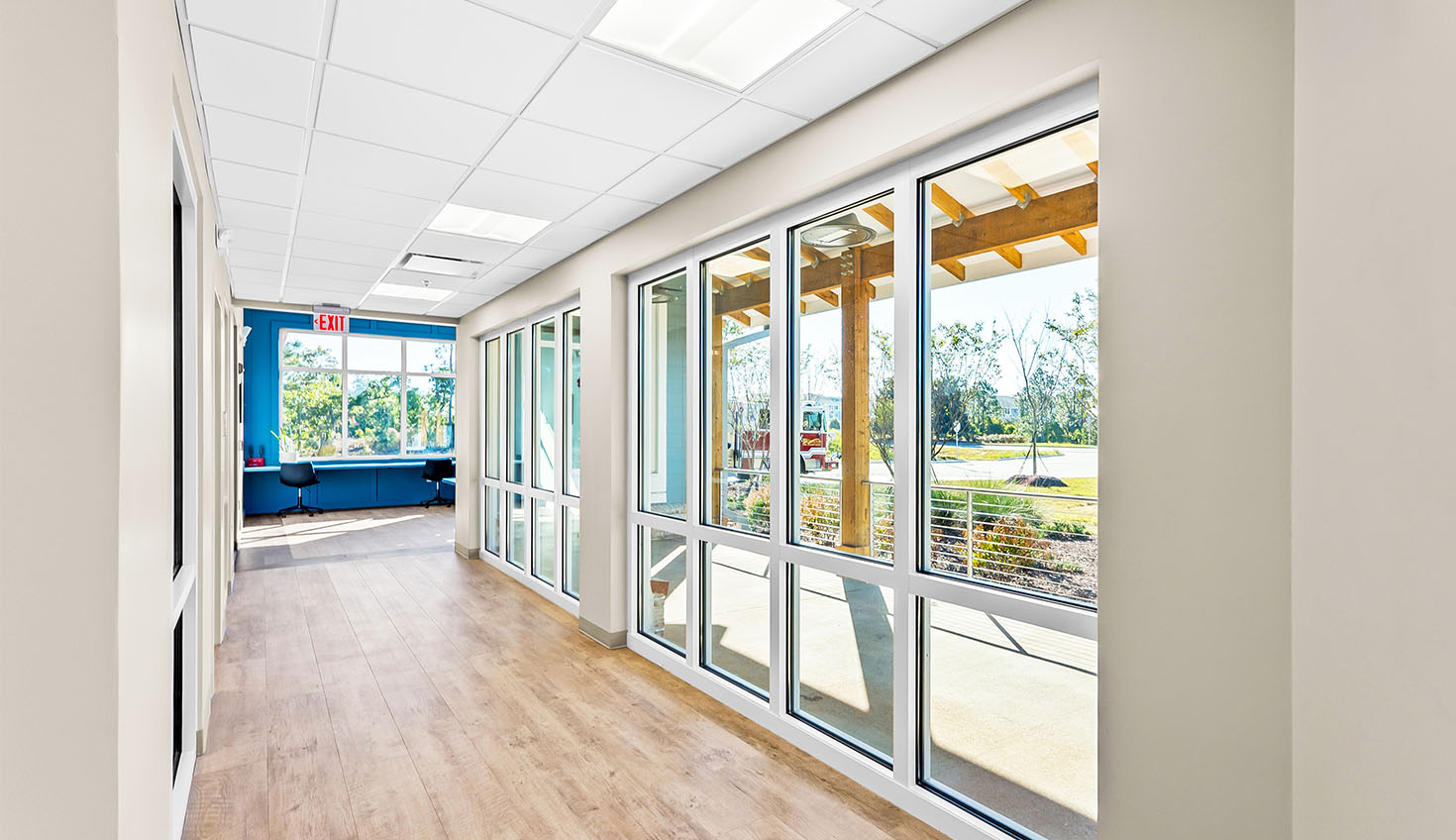 a long hallway with lots of windows in it