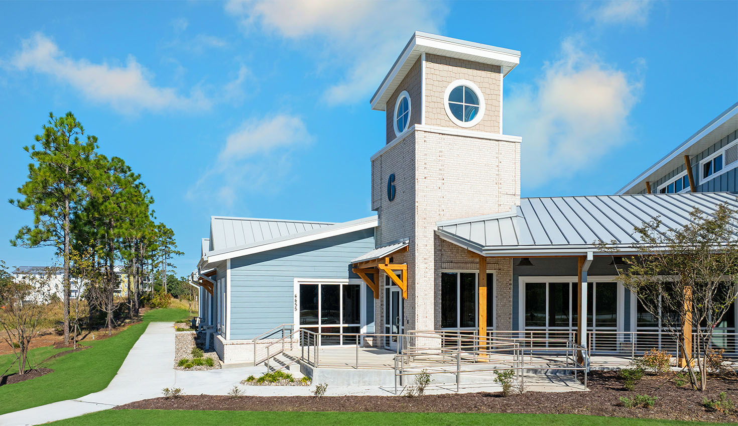 the front of a building with a clock tower