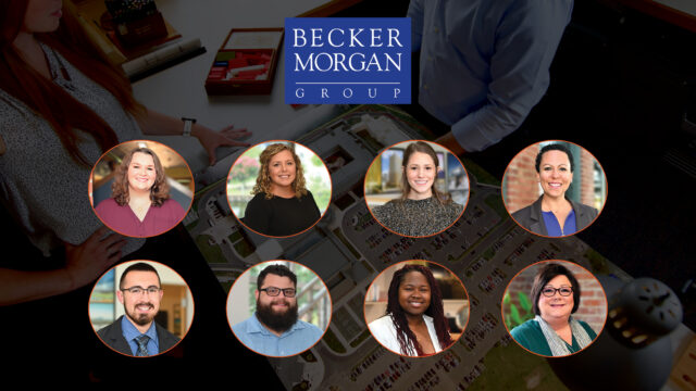 a group of people standing in front of a building