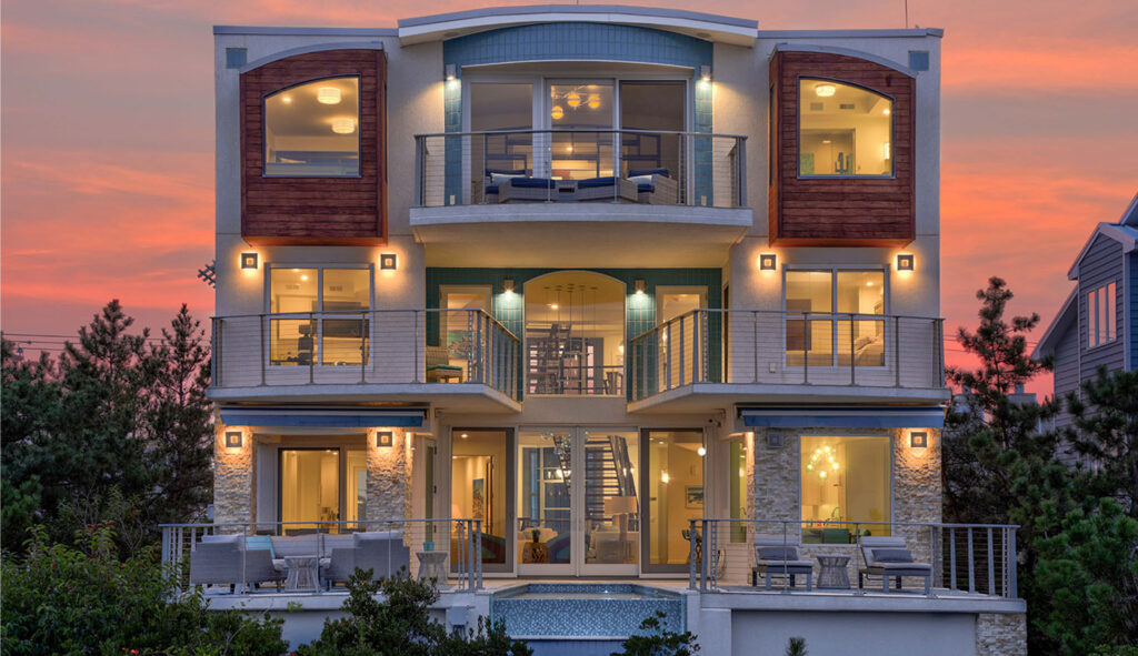 a large house with a lot of windows and balconies