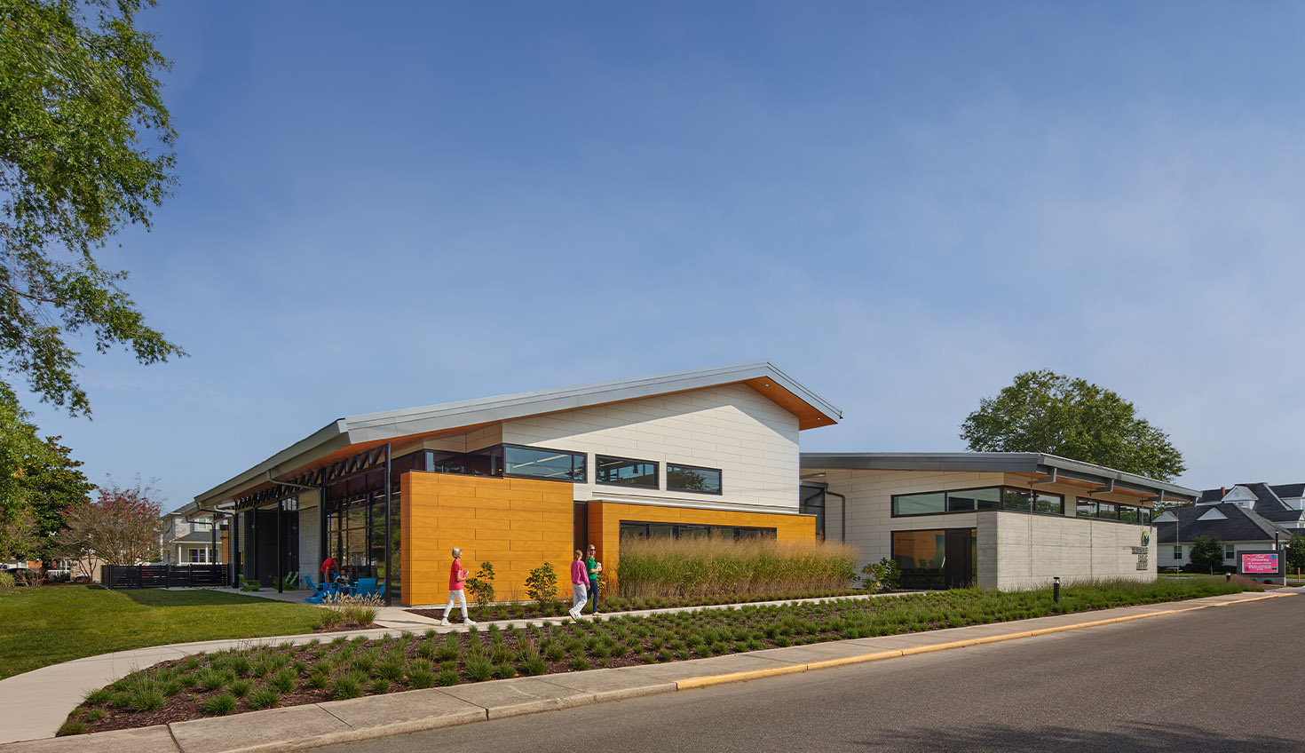 a house with a lot of windows on the side of it