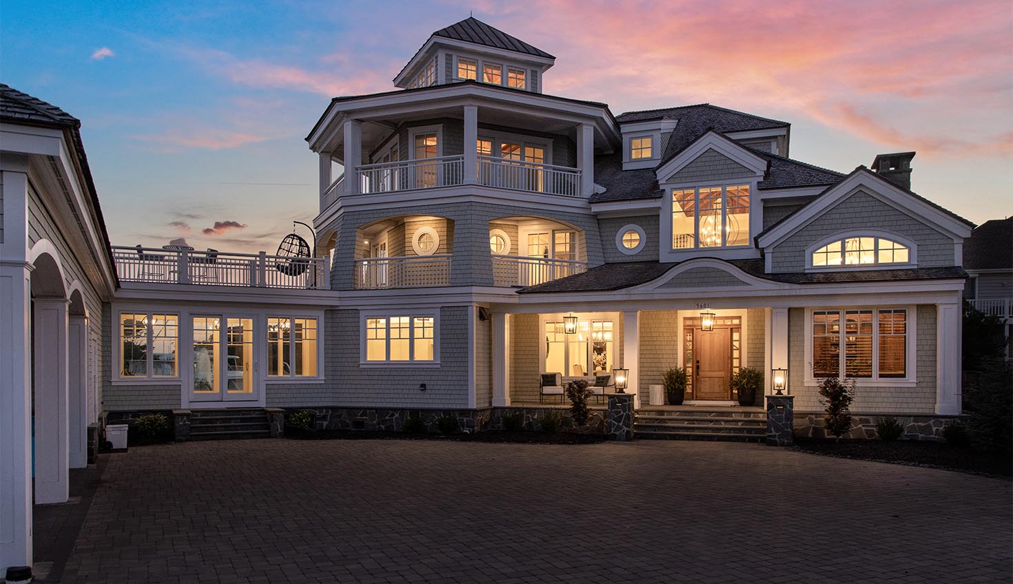 a large white house with lots of windows