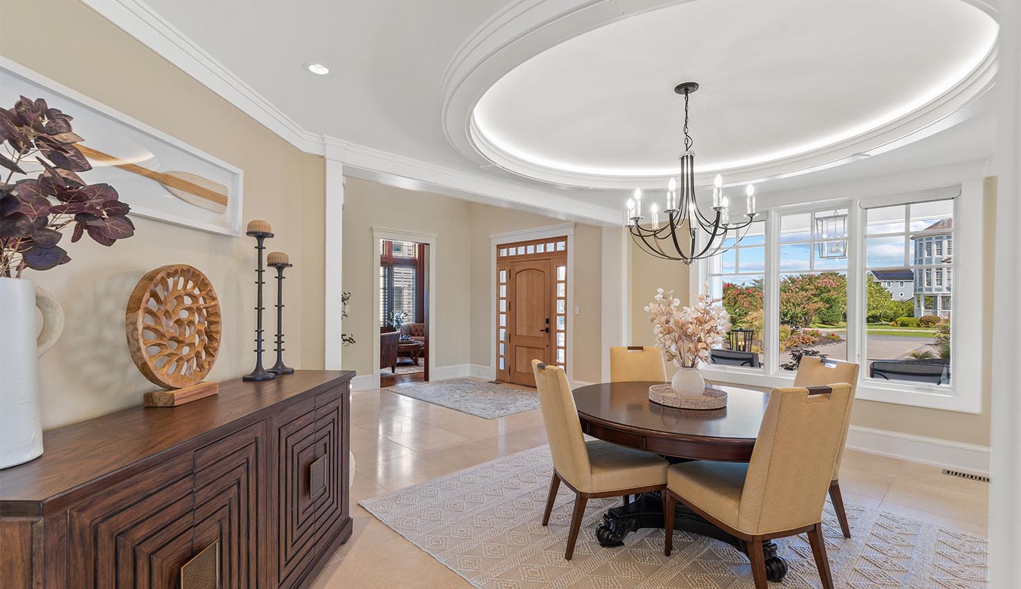 a dining room with a table and chairs