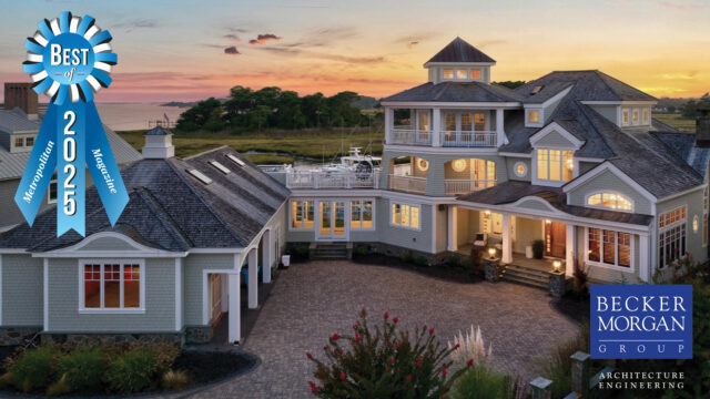 an aerial view of a house with a blue ribbon