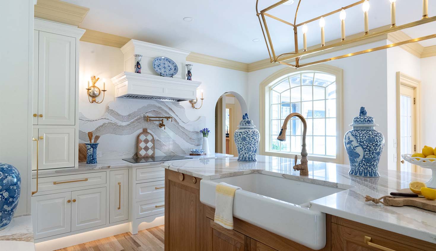 a kitchen with a sink and a large window