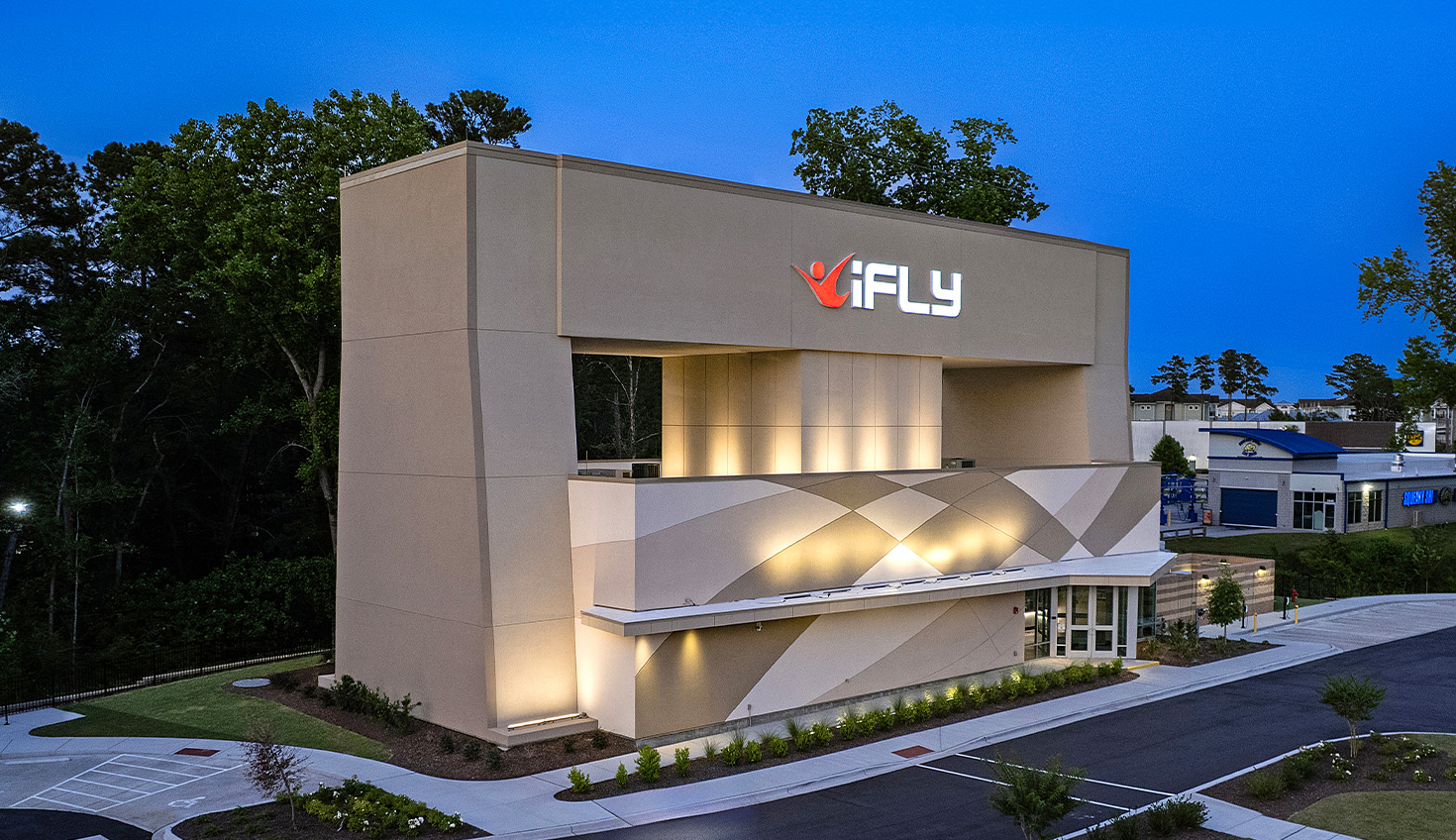 a building with a sign that says fly above it