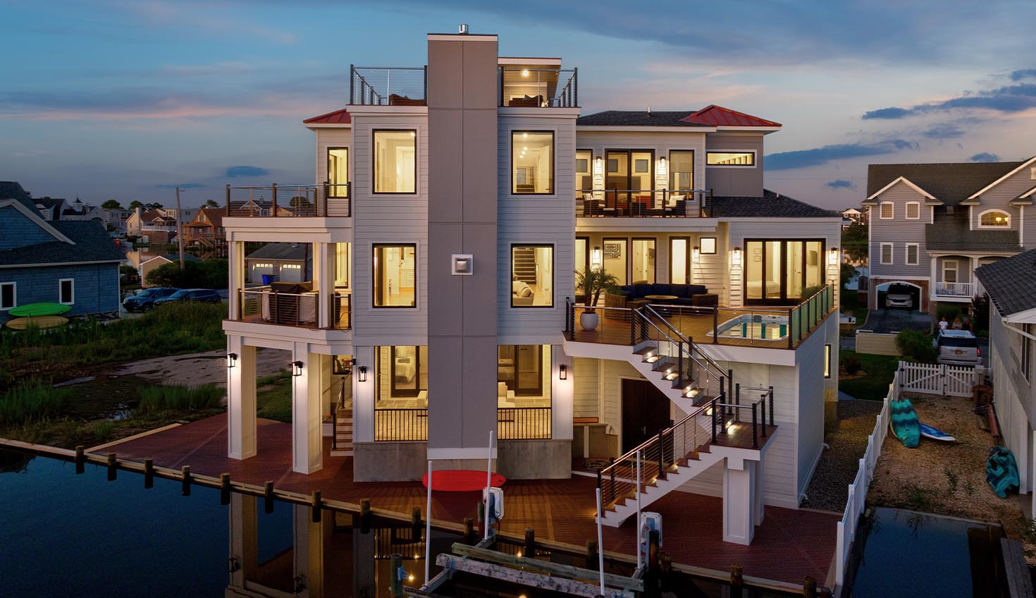 an aerial view of a house at dusk