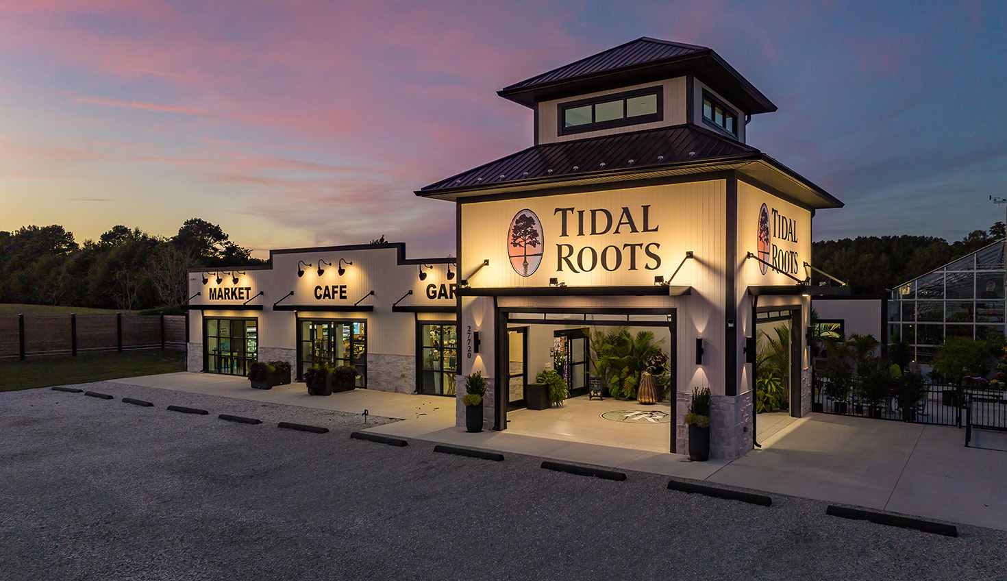 the front of a restaurant at dusk