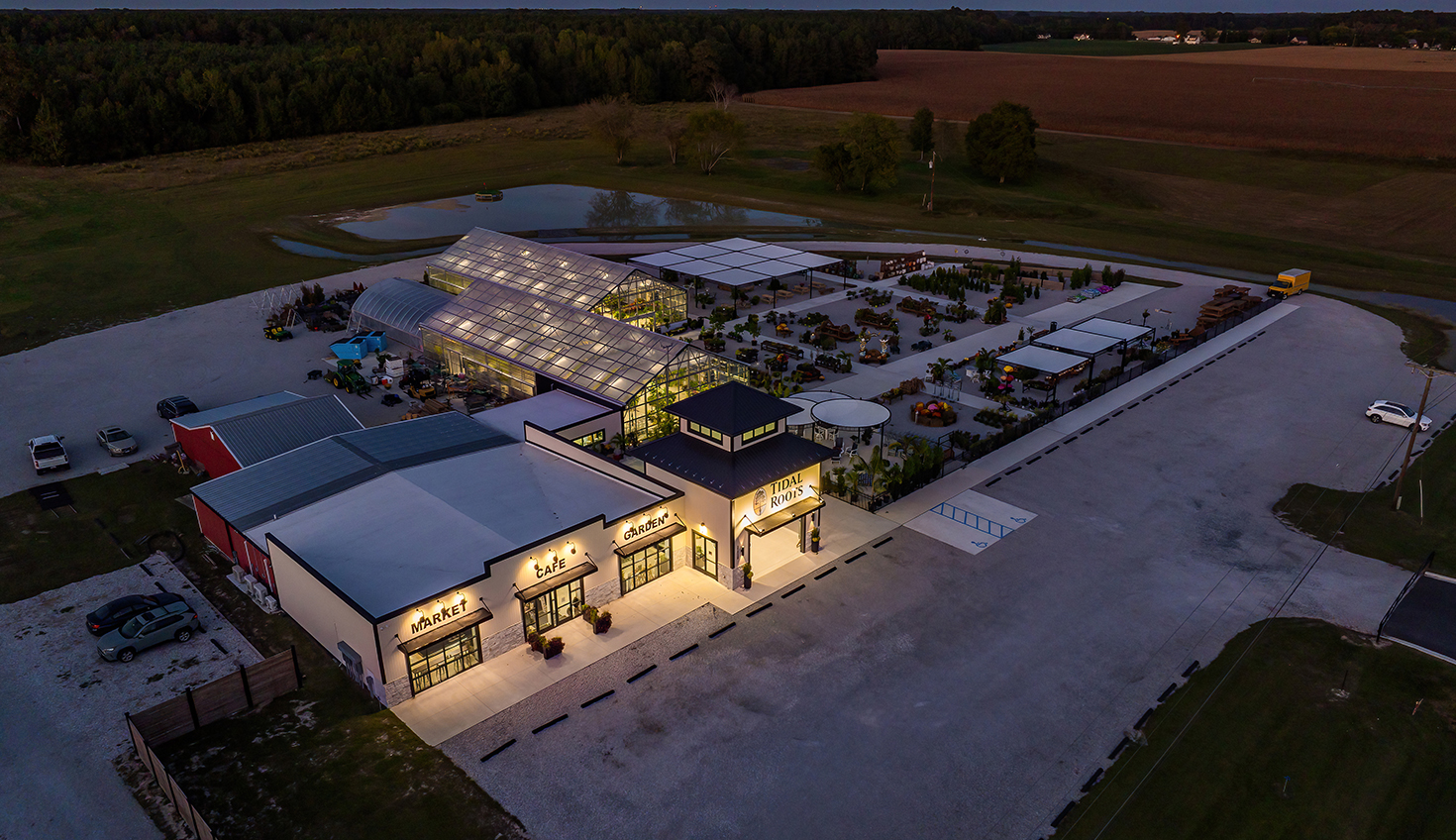 an aerial view of a building at dusk