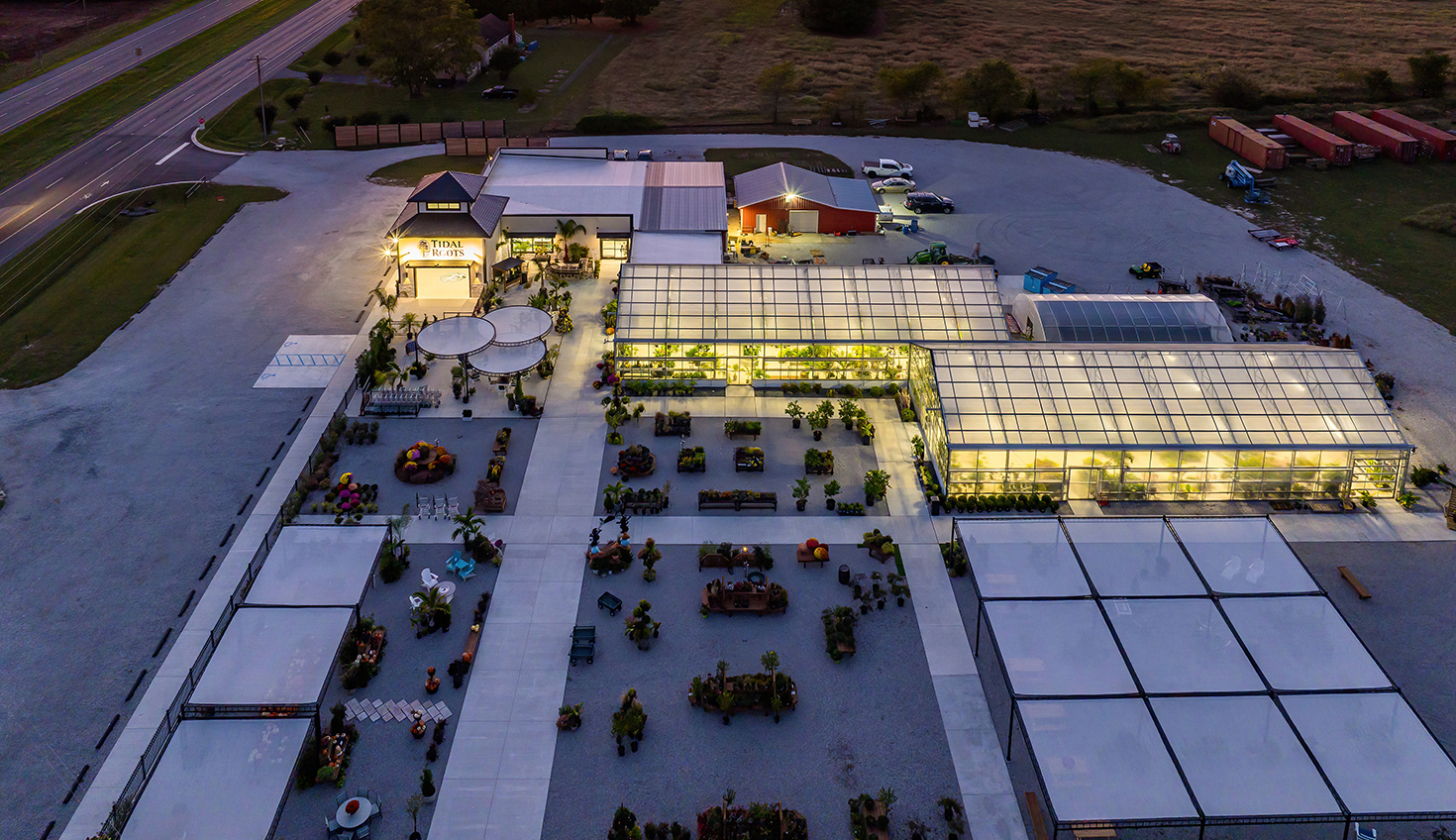 an aerial view of a building at dusk