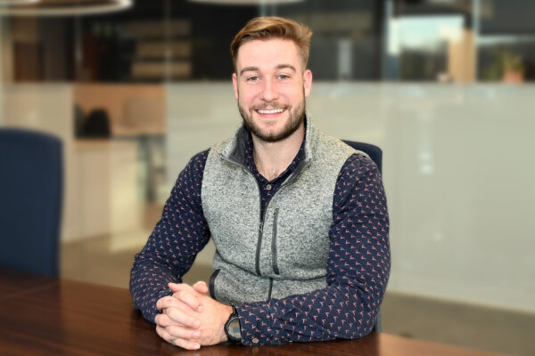 a man sitting at a desk in an office