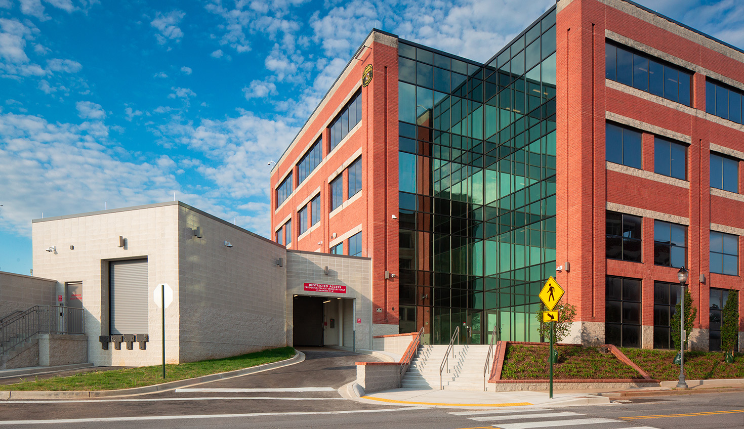 a large red building with a glass front