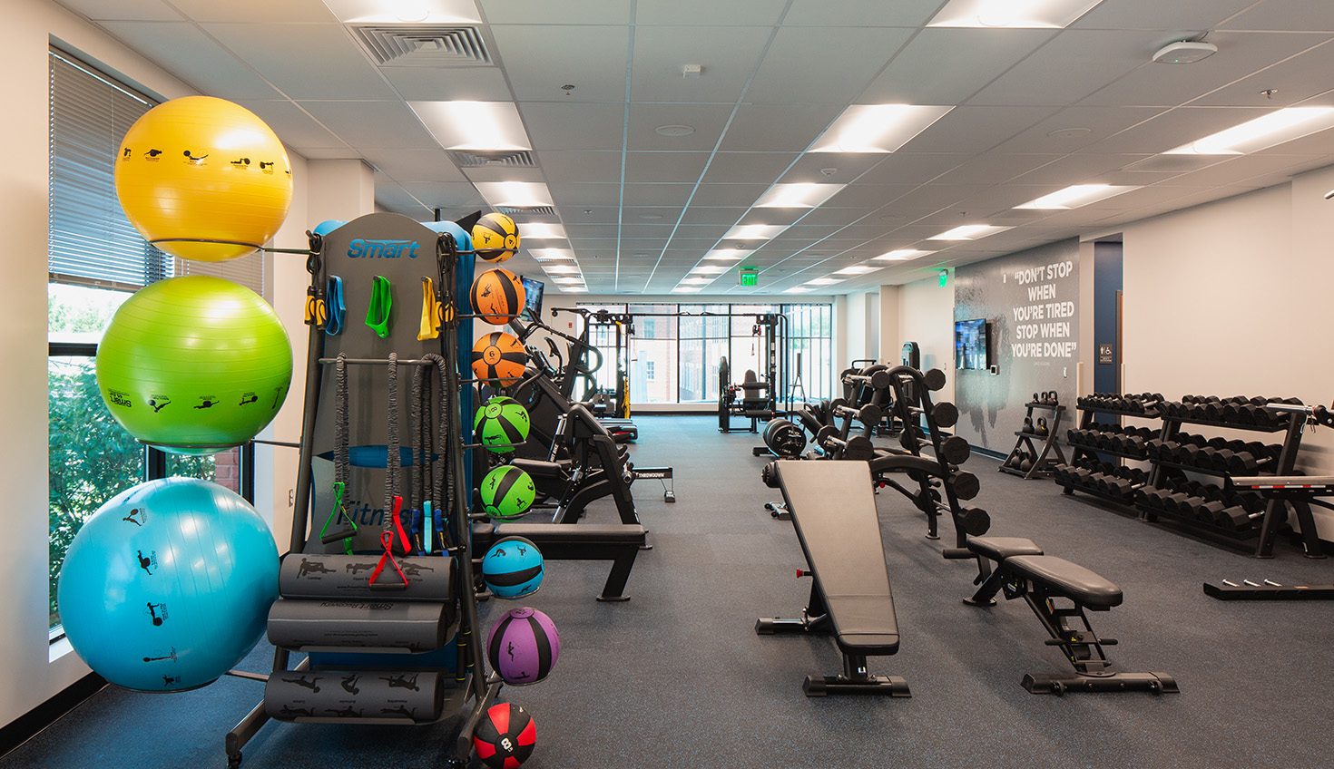 a gym filled with lots of exercise equipment