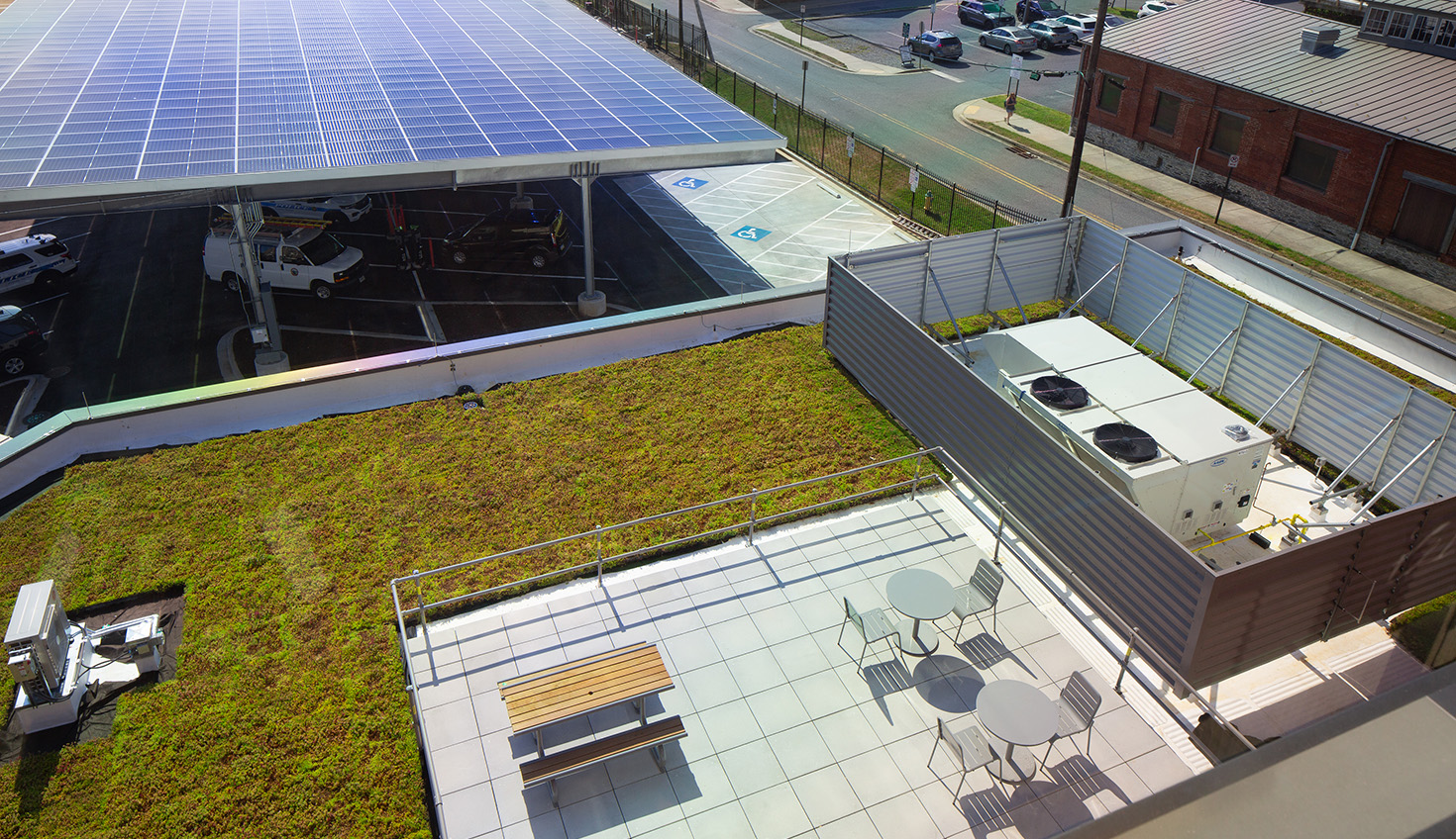 a green roof with a solar panel on top of it