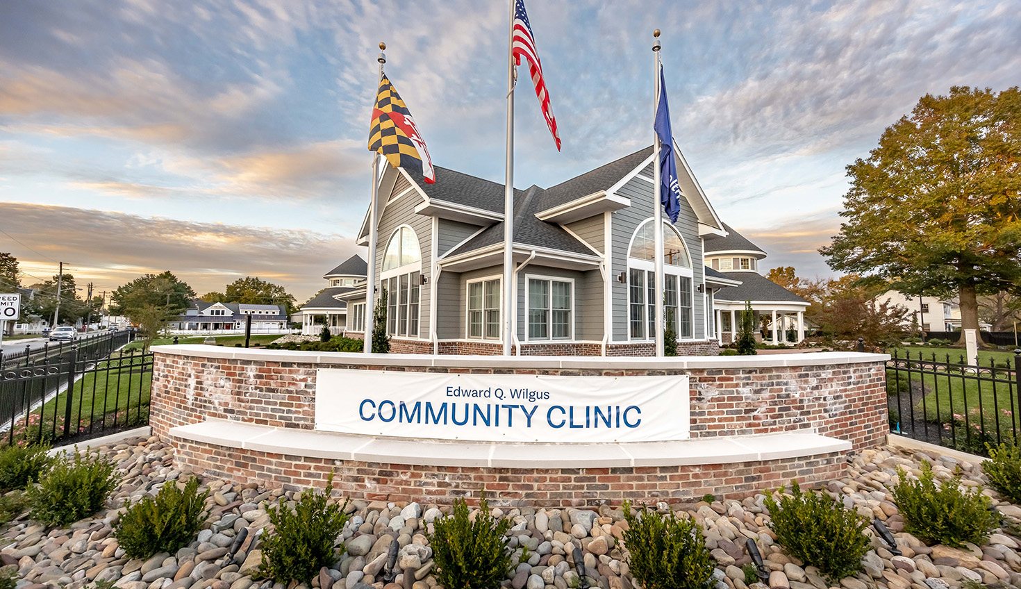 the community clinic sign in front of a building
