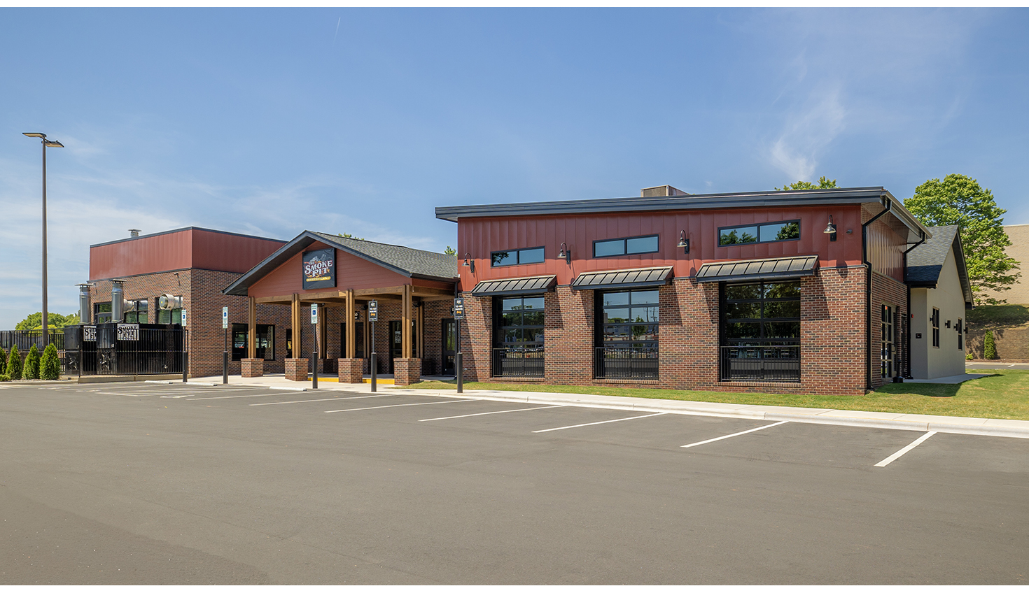 a building with a parking lot in front of it
